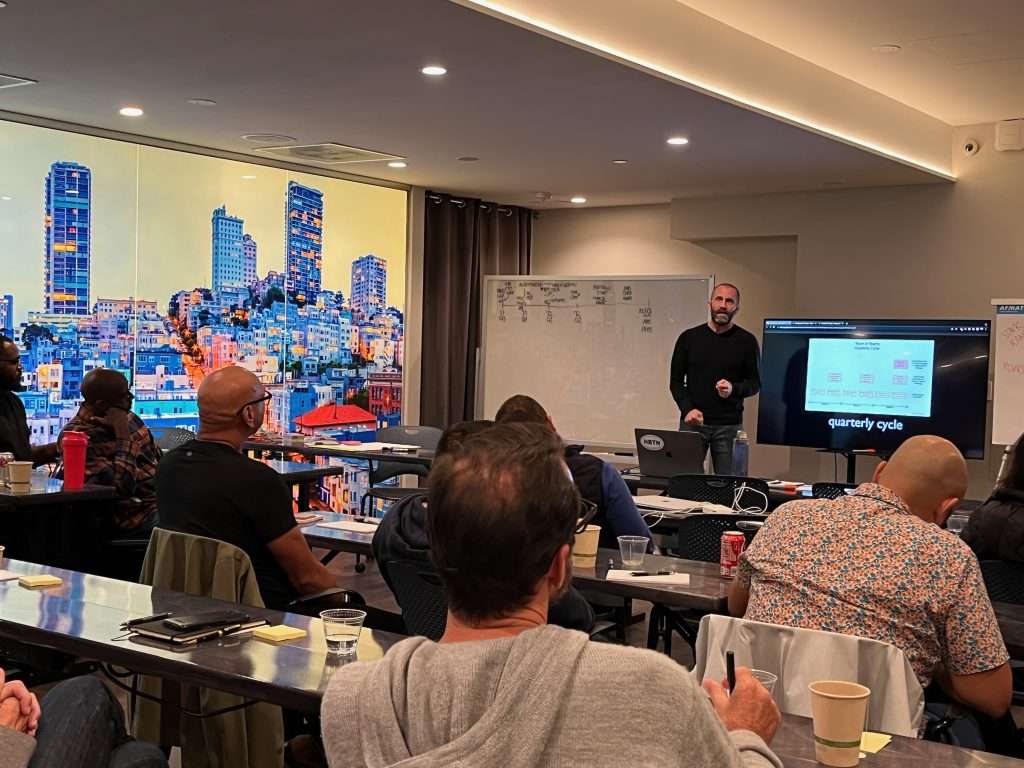 Photograph of Barry Hawkins leading an onsite workshop